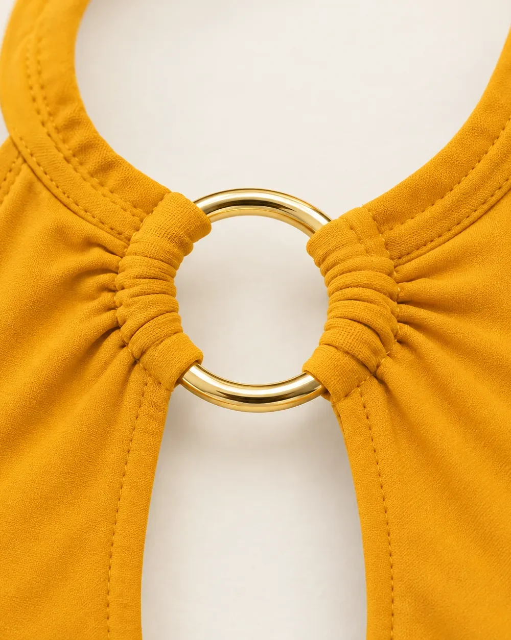 Apogee Halter Top, close-up of the gold ring