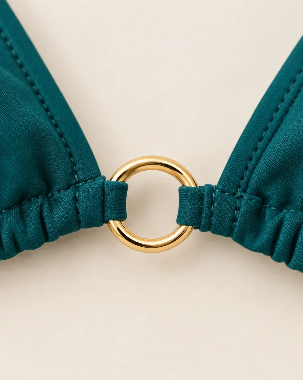 Comet Micro Triangle Top, close-up of the gold ring