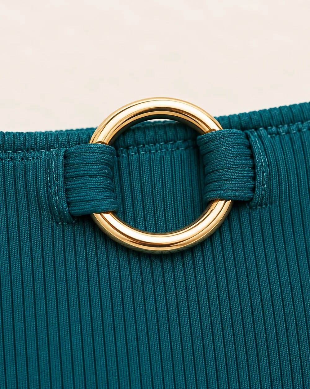 Corona Mid-rise Bottom, close-up of the gold ring