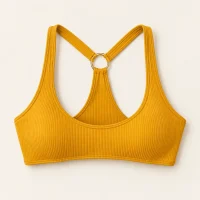 Equinox Racer Top, laid flat, front view