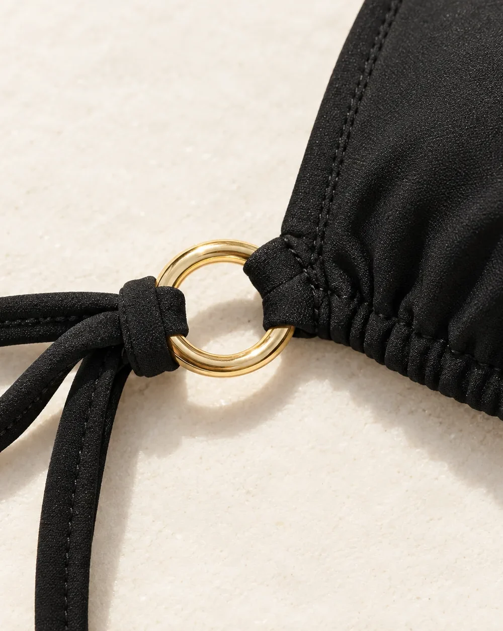 Nova Tie Triangle Top, close-up of the gold ring