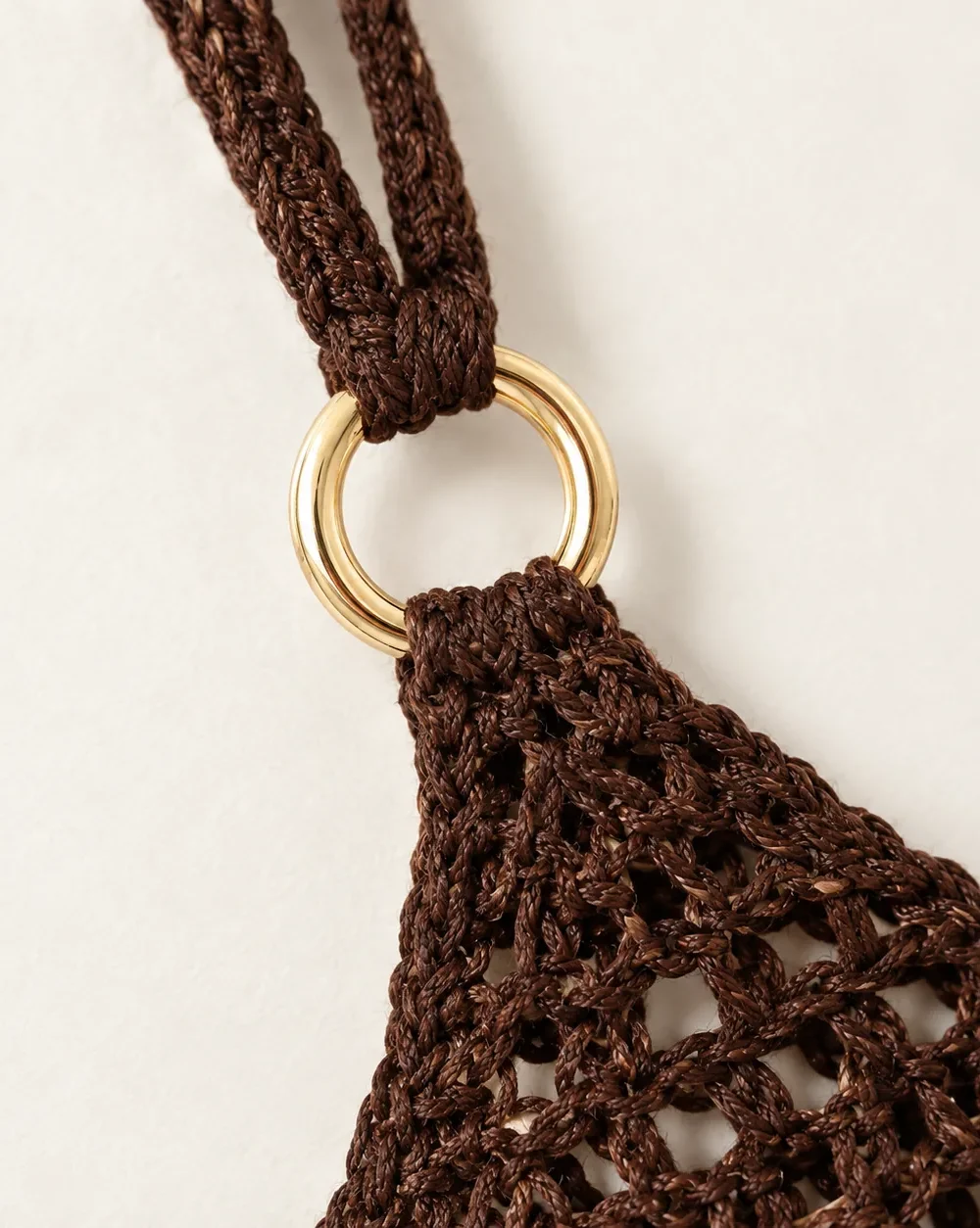 Orbit Crochet Mini Dress, close-up of the gold ring