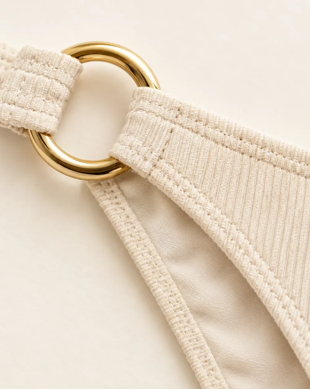 Perigee Hipster Bottom, close-up of the gold ring