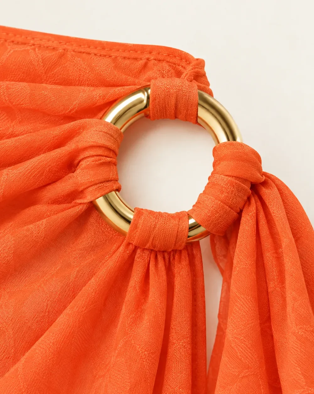 Ring-tie Long Sarong, close-up of the gold ring