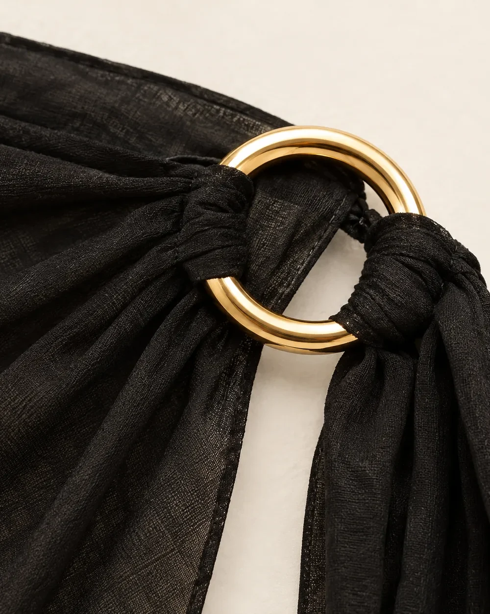 Ring-tie Mini Sarong, close-up of the gold ring