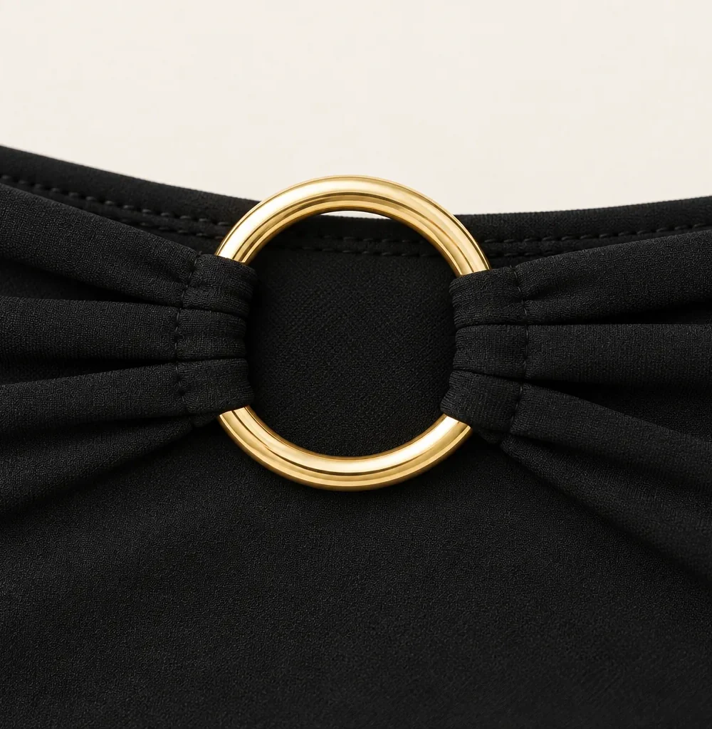 Saturn High-waist Bottom, close-up of the gold ring