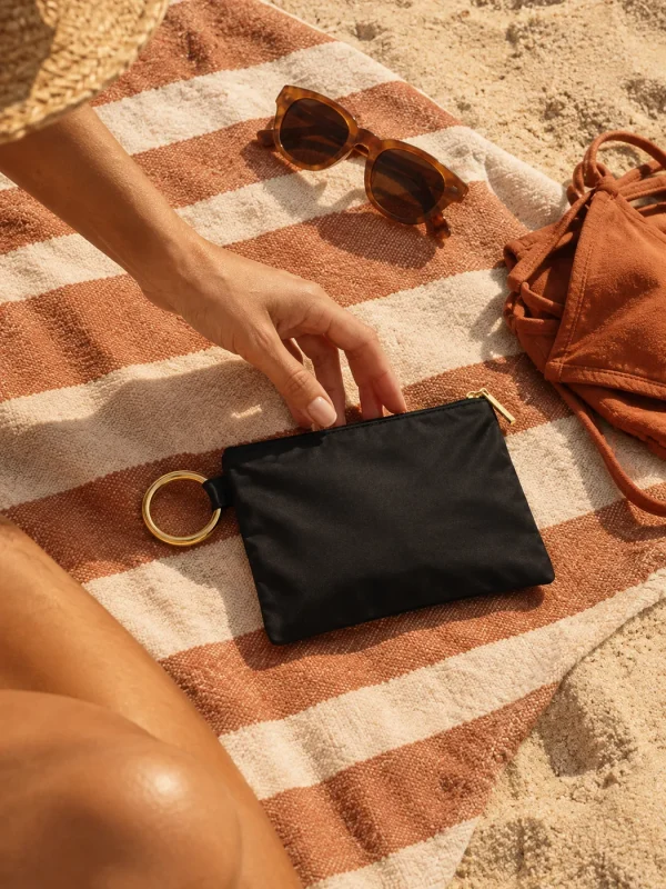 Ring-handle Swim Pouch, worn on the beach